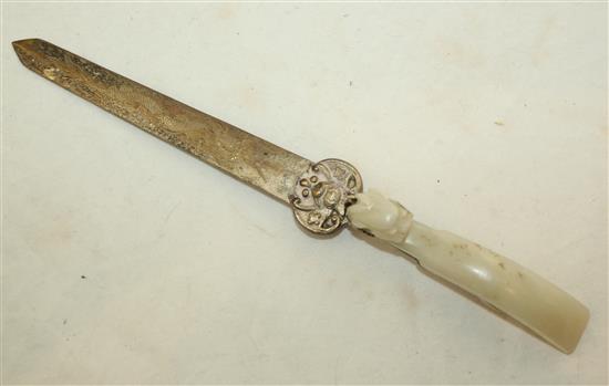 A Chinese pale celadon jade belt hook, mounted as a paperknife, 19th century, handle 9.4cm